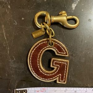 Coach Bag accent tag “G”